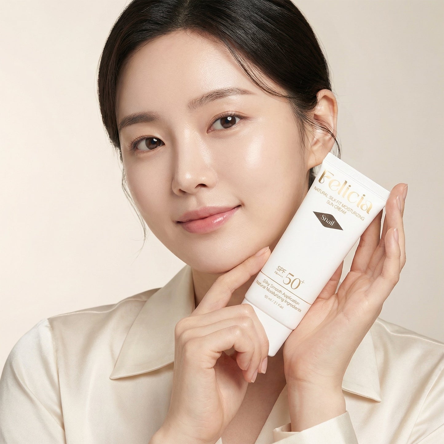 Natural Silk Fit Moisturizing Snail Sun Cream